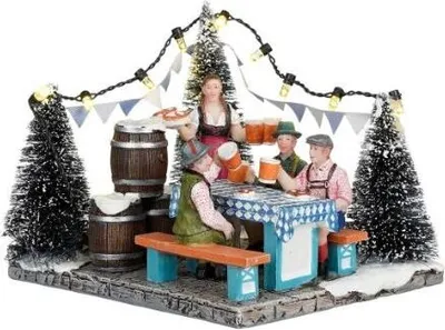 A miniature scene depicting a German beer garden with people drinking and a waitress serving.