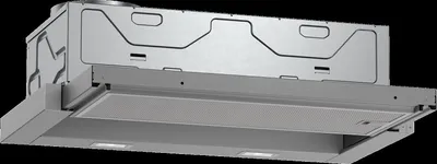 A close-up, studio shot of a stainless steel range hood, viewed from a slightly low angle.