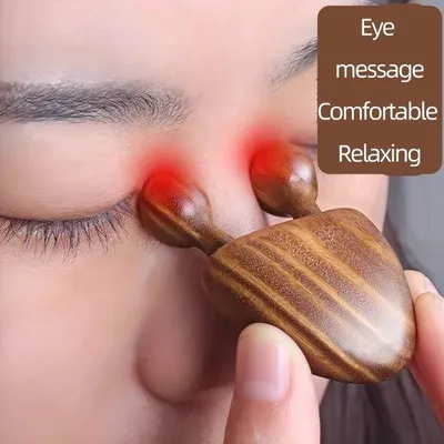 Image de Appareil de massage facial en bois à deux sièges, pour la détente et le massage des yeux.