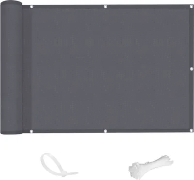 A rolled-up gray privacy screen with grommets and a bundle of white zip ties on a white background.