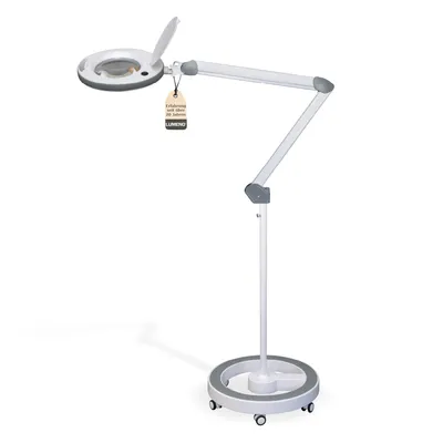 A white background studio shot of a floor-standing magnifying lamp.