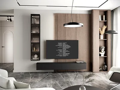 A modern living room with a TV unit, shelving, and a sofa.