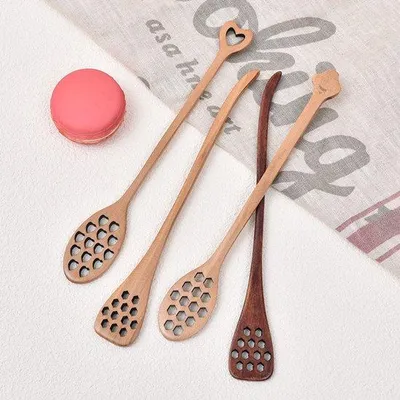 Produktbild von Höhlenförmiger Honigdip-Set mit Holz-Dip-Prügel, langem Stiel, Rührstock und Löffel.