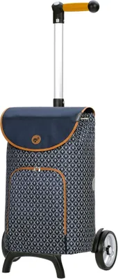 A shopping trolley with a patterned fabric body and a telescopic handle.