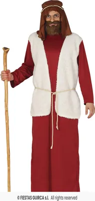 A man wearing a shepherd costume, holding a staff.
