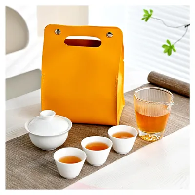 Produktbild von Gaiwan Teeservice aus Keramik, tragbar mit Aufbewahrungstasche für Zuhause und unterwegs