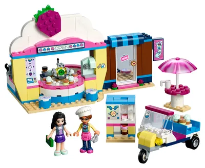 A LEGO Friends Olivia's Cupcake Cafe playset with figures, a food truck, and various accessories.