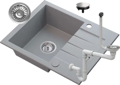 A granite sink and its plumbing accessories are displayed against a white background.