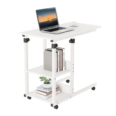 A white rolling desk with a laptop, books, and a plant on it, set against a white background.