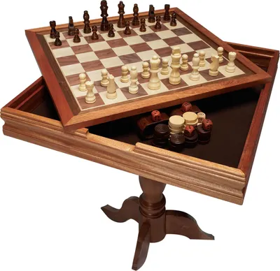 A wooden chess set with pieces on the board, displayed on a table with a drawer.