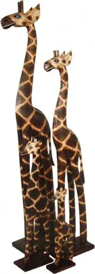 A set of wooden giraffe figurines of varying sizes.