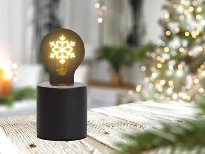 Produktbild von Kleine Tischlampe Beton Schwarz Ø 9cm mit Deko LED Glühbirne Schneeflocke Gold
