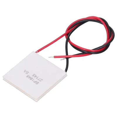 A square white thermoelectric generator module with red and black wires attached, lying on a white background.