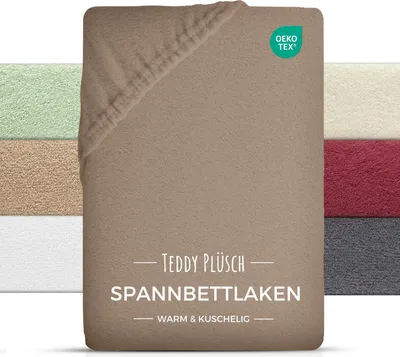 A close-up of a brown fitted sheet with a swatch of other colors visible on the left and right.