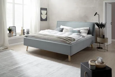 Produktbild von Meise Möbel Stauraumbett Frieda 160x200 cm | Bettkasten & Lattenrost | Webstoff Eisblau | Holzfuß eichefarbig
