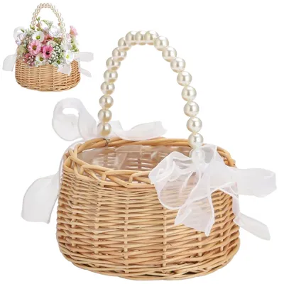 Image de Panier en osier fait à la main, avec des fleurs et une anse