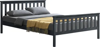 A dark gray wooden bed frame with a slatted headboard and footboard, shown with two gray pillows and a yellow throw blanket.