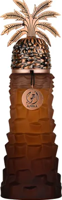 A perfume bottle with a palm tree-like design.
