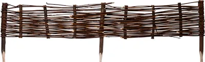 A woven willow border fence with pointed stakes.