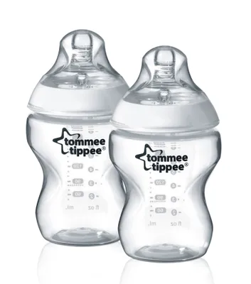 Two clear baby bottles with white nipples and white collars are shown against a white background.