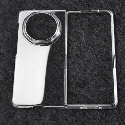 A transparent phone case is laid flat on a dark gray textured surface.