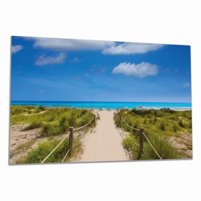 Produktbild von Wallario Herdabdeckplatte aus Glas, Größe 90 x 52 cm 1-teilig, Motiv Sandweg zum blauen Meer mit blauem Himmel