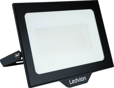 A black floodlight with a white light panel, shown at an angle on a white background.