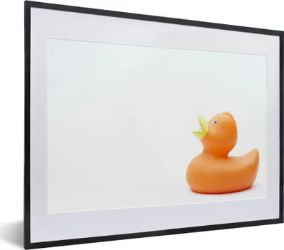 Produktbild von MuchoWow® MuchoWow® Gerahmtes Poster Gummi-Ente - Orange - Weiß 40x30 cm - Poster mit zchwarzem Bilderrahmen - Bilderrahmen - Poster im Rahmen