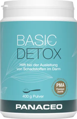 A white cylindrical container of Panaceo Basic Detox powder against a teal background with white line art.