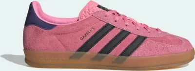 A side view of a pink Adidas Gazelle Indoor shoe.