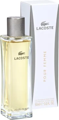 A bottle of Lacoste Pour Femme eau de Parfum and its packaging are displayed against a white background.