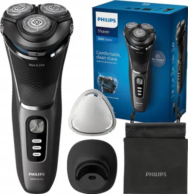 A Philips shaver and its accessories are displayed against a white background, along with its packaging.