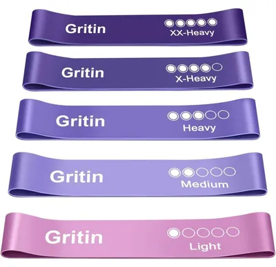 Obrázek produktu pro Sada pěti fitness gum (odporových pásek) fialové barvy, vyrobených z latexu, o rozměrech 60 cm x 5 cm, včetně návodu a obalu