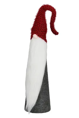 A Christmas gnome decoration with a red hat and white beard.