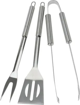 A set of stainless steel barbecue tools including a spatula, fork, and tongs, arranged on a white background.