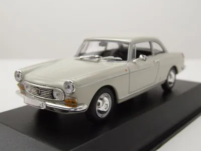 Zdjęcie produktu dla Maxichamps 940112920 Peugeot 404 Coupe 1962 biały 1:43