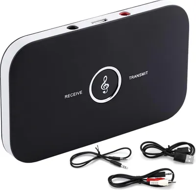 A black Bluetooth transmitter/receiver adapter with cables on a white background.