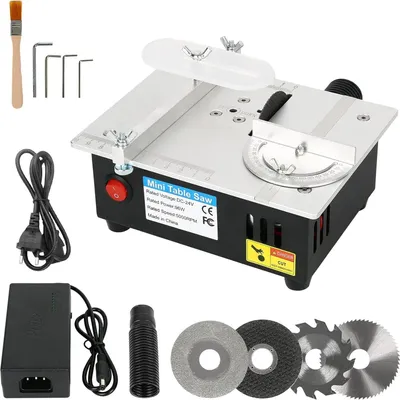 A mini table saw and its accessories are displayed on a white background.