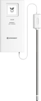 A white soil sensor with a probe attached by a wire.