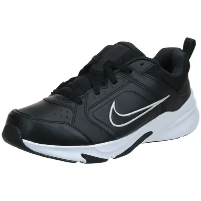 A black Nike shoe with a white sole and white Nike swoosh logo.