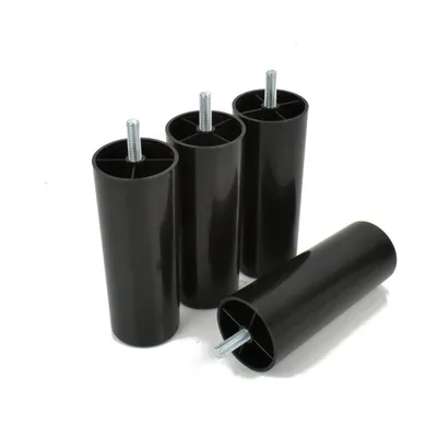 Four black plastic furniture legs with metal screws are arranged on a white background.