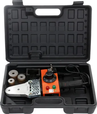 A plastic carrying case containing a polyfusion welding tool and its accessories.