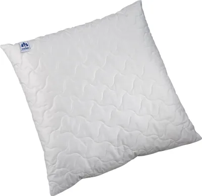 A white quilted pillow on a white background.