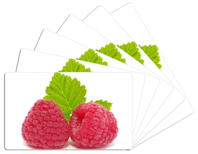 Produktbild von Wallario Frühstücksbrettchen 6er Set aus Glas, je 14 x 23 cm, mit rutschfesten Füßen, Motiv Himbeeren mit grünem Blatt auf weißem Grund