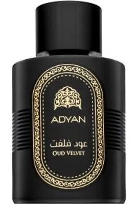 A black perfume bottle with gold accents and text on a white background.