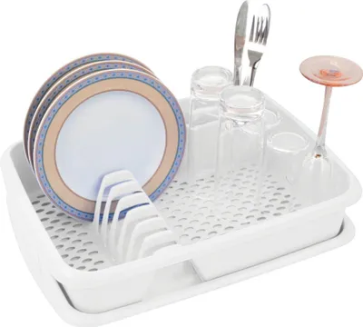 A white dish drying rack filled with plates, glasses, and cutlery.