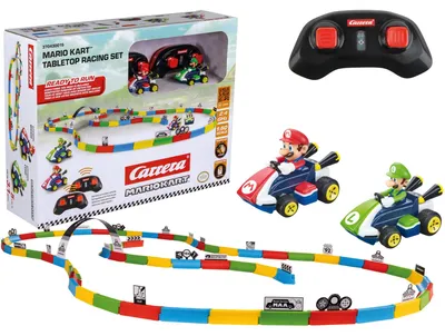Produktbild von Carrera RC Mario Kart™  Tabletop Racing Set | Mini RC Car Race Track Set | Set mit zwei ferngesteuerten Autos (Mario & Luigi) | mit div. Streckenteilen für einen Rennkurs | 2.4 GHz Fernsteuerungstechnik | inkl. Akkus und Batterien