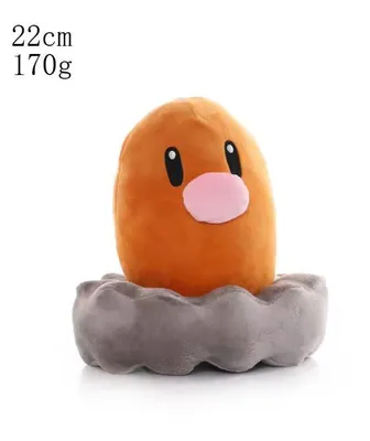 A Diglett plush toy emerging from a dirt mound.