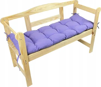 A light purple cushion on a wooden bench.