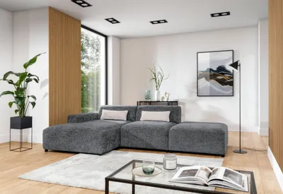 Produktbild von Ecksofa Designersofa ROMY in Stoff Enjoy Me Grau Ottomane Links